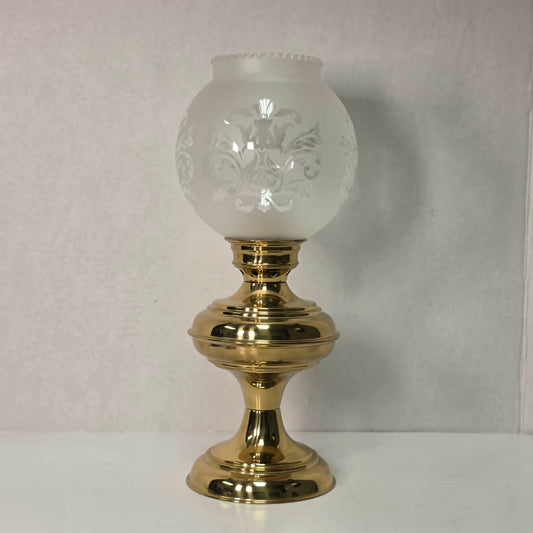 Vintage brass hurricane candle holder with elegant etched glass globe.