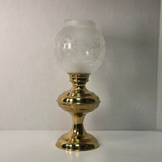 Vintage brass hurricane candle holder with elegant etched glass globe.
