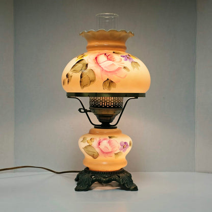 Elegant vintage hurricane lamp with floral glass design