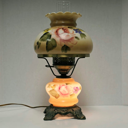 Elegant vintage hurricane lamp with floral glass design