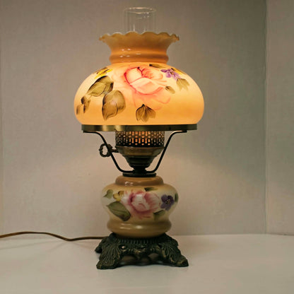 Elegant vintage hurricane lamp with floral glass design
