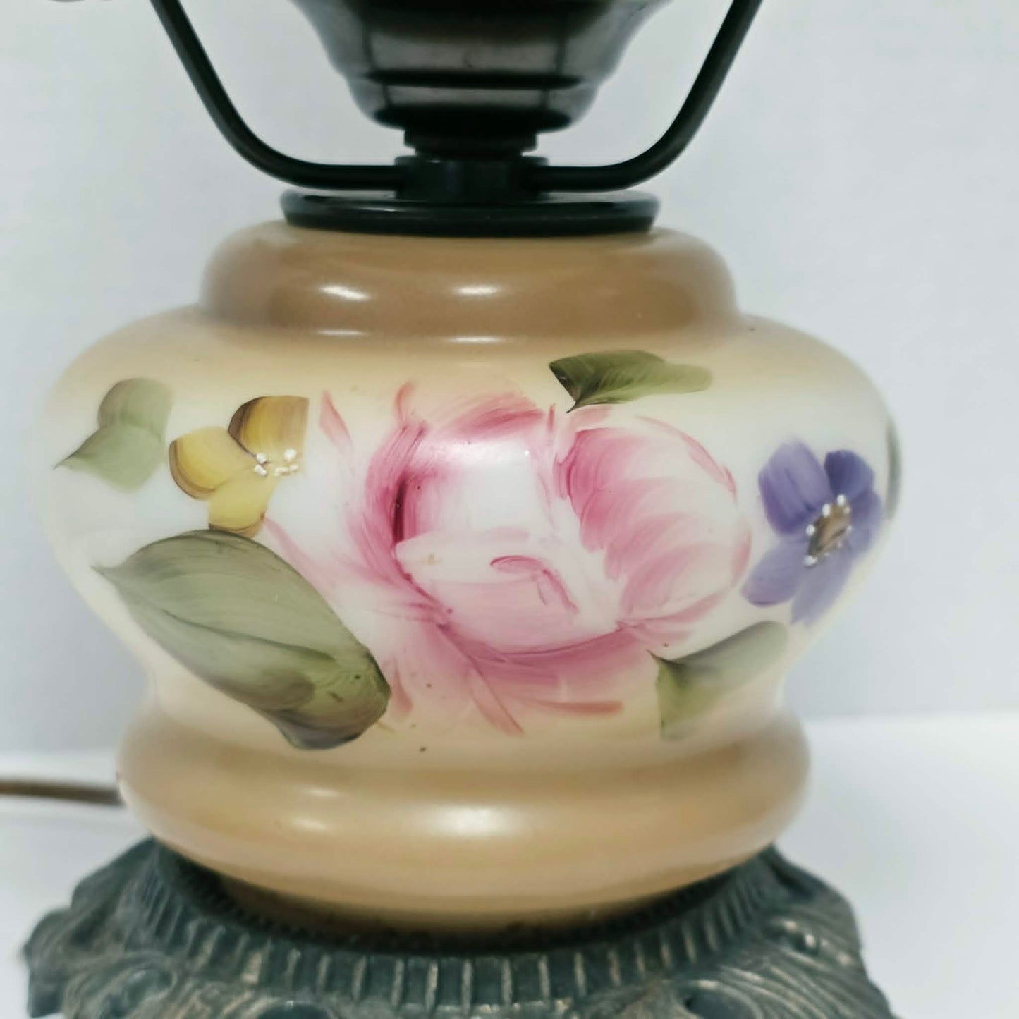 Elegant vintage hurricane lamp with floral glass design