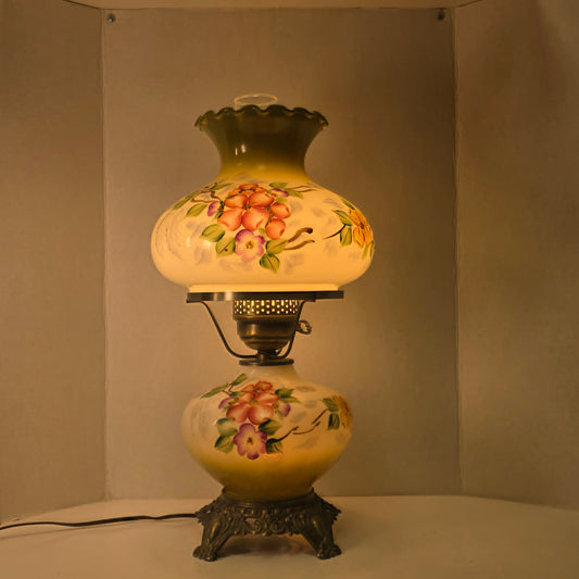 Vintage hurricane lamp with pastel hand-painted floral glass and dual lighting feature.