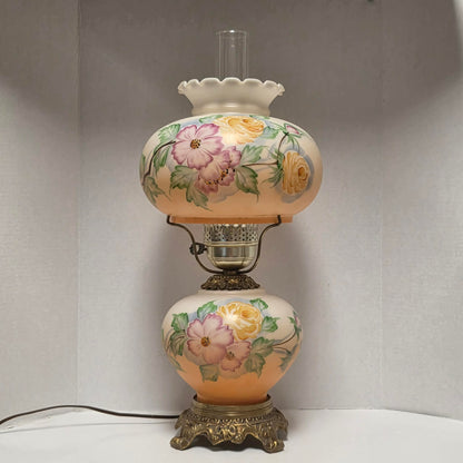 Vintage Gone with the Wind hurricane lamp with pink cosmos and yellow rose floral glass design.