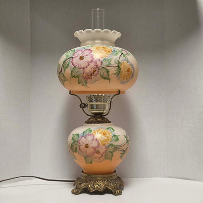 Vintage Gone with the Wind hurricane lamp with pink cosmos and yellow rose floral glass design.