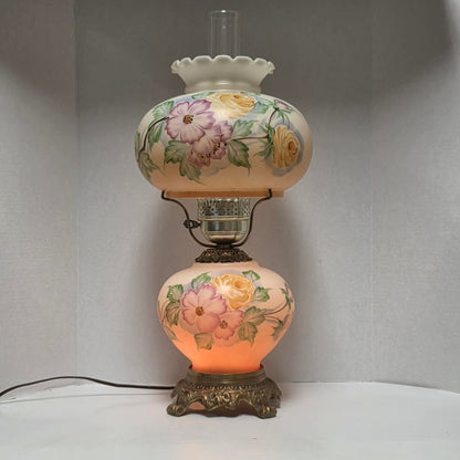 Vintage Gone with the Wind hurricane lamp with pink cosmos and yellow rose floral glass design.