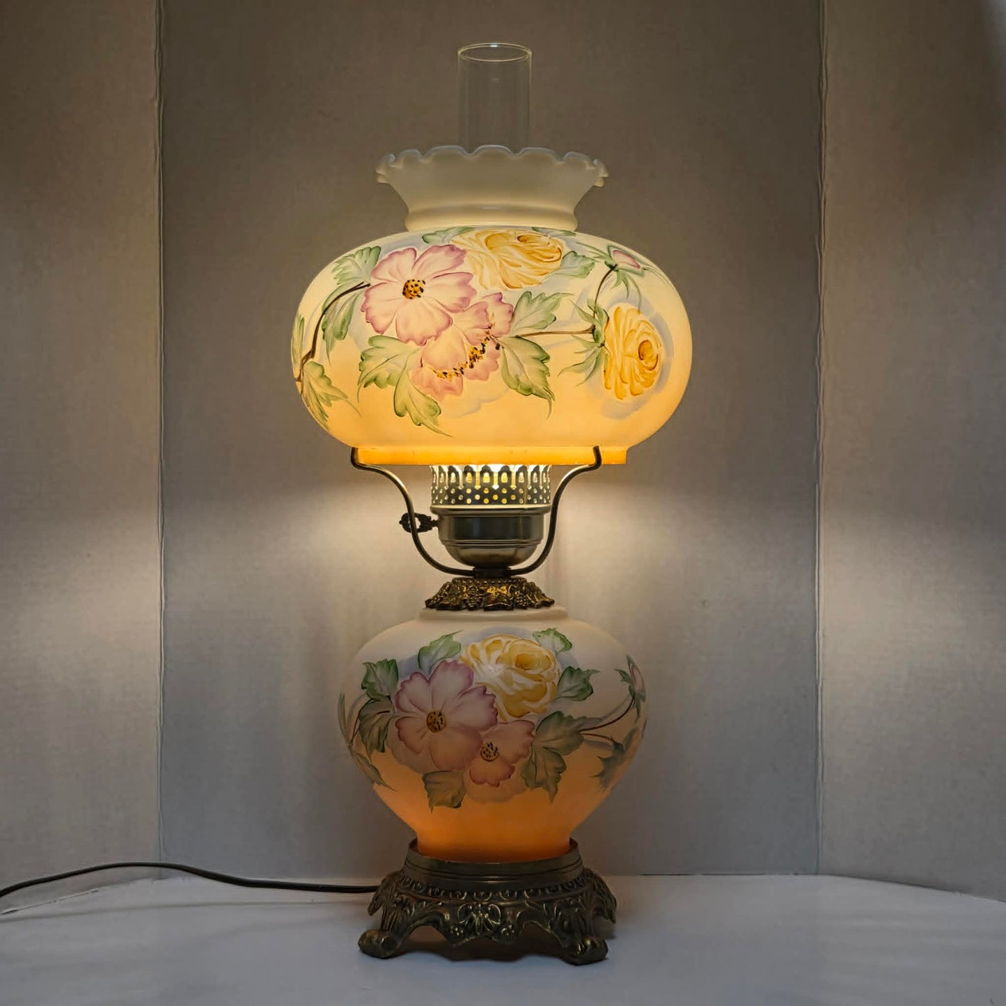 Vintage Gone with the Wind hurricane lamp with pink cosmos and yellow rose floral glass design.
