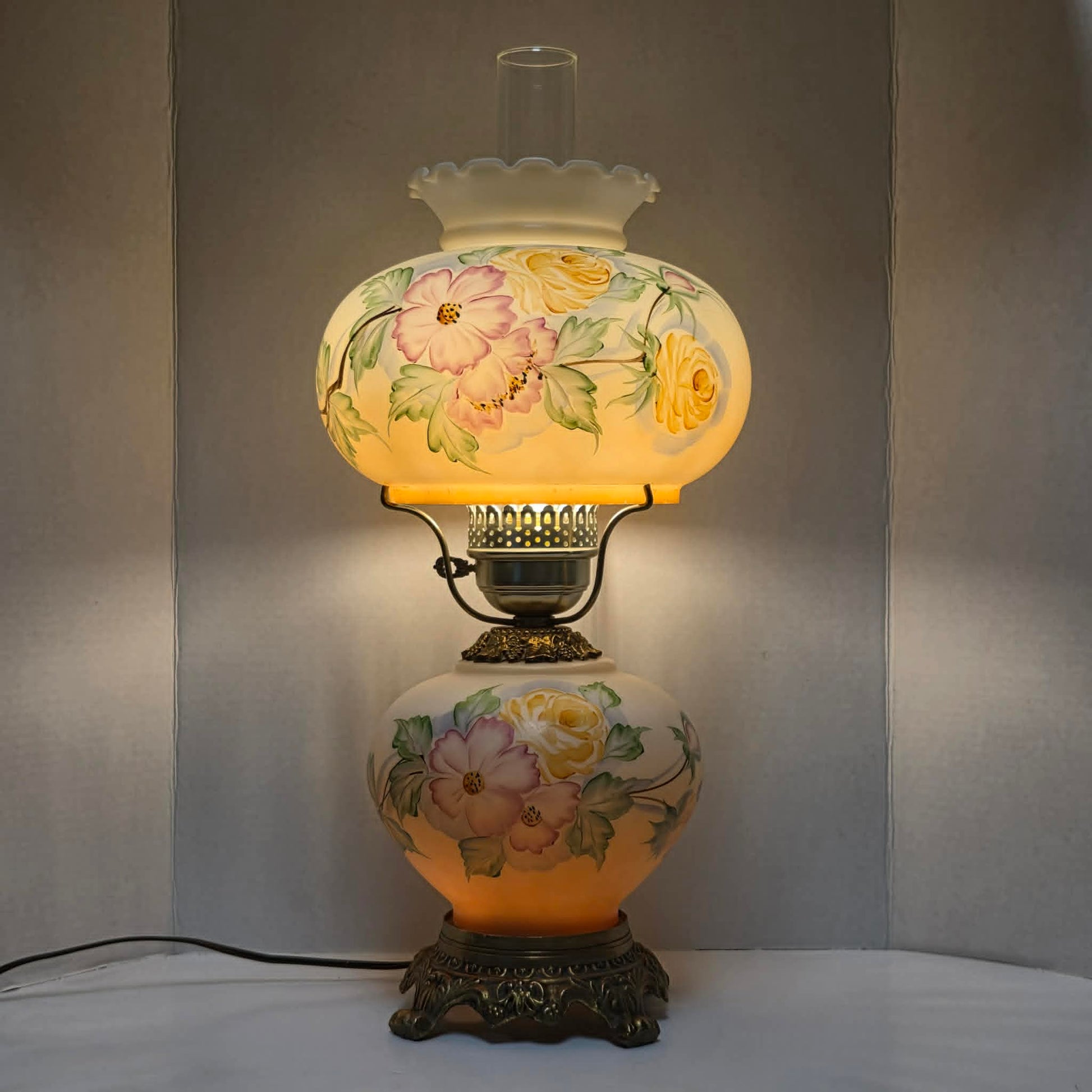Vintage Gone with the Wind hurricane lamp with pink cosmos and yellow rose floral glass design.