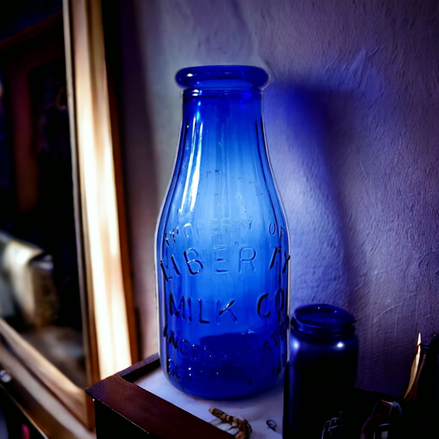 Vintage Cobalt Blue Embossed Liberty Milk Bottle