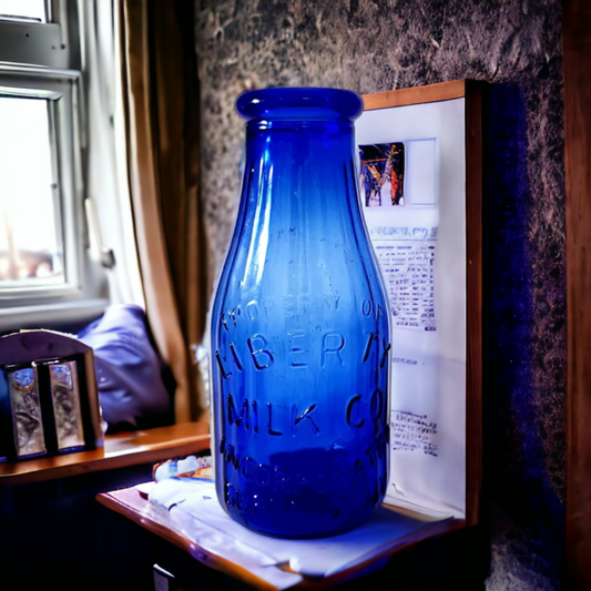 Vintage Cobalt Blue Embossed Liberty Milk Bottle