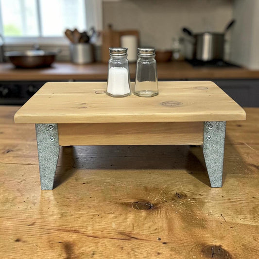 Handmade reclaimed cedar and barn metal serving riser with rustic charm.