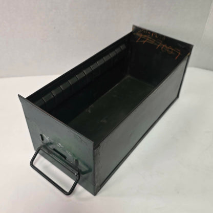 Antique industrial apothecary drawer with bail handle and label holder, vintage storage bin with aged patina.