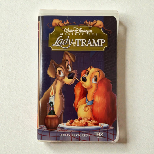 VHS tape cover of 'Lady and the Tramp' with animated dogs on a white background