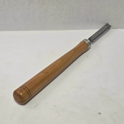 A substantial vintage woodturning gouge built for quality craftsmanship, shaping, and precision lathe work.