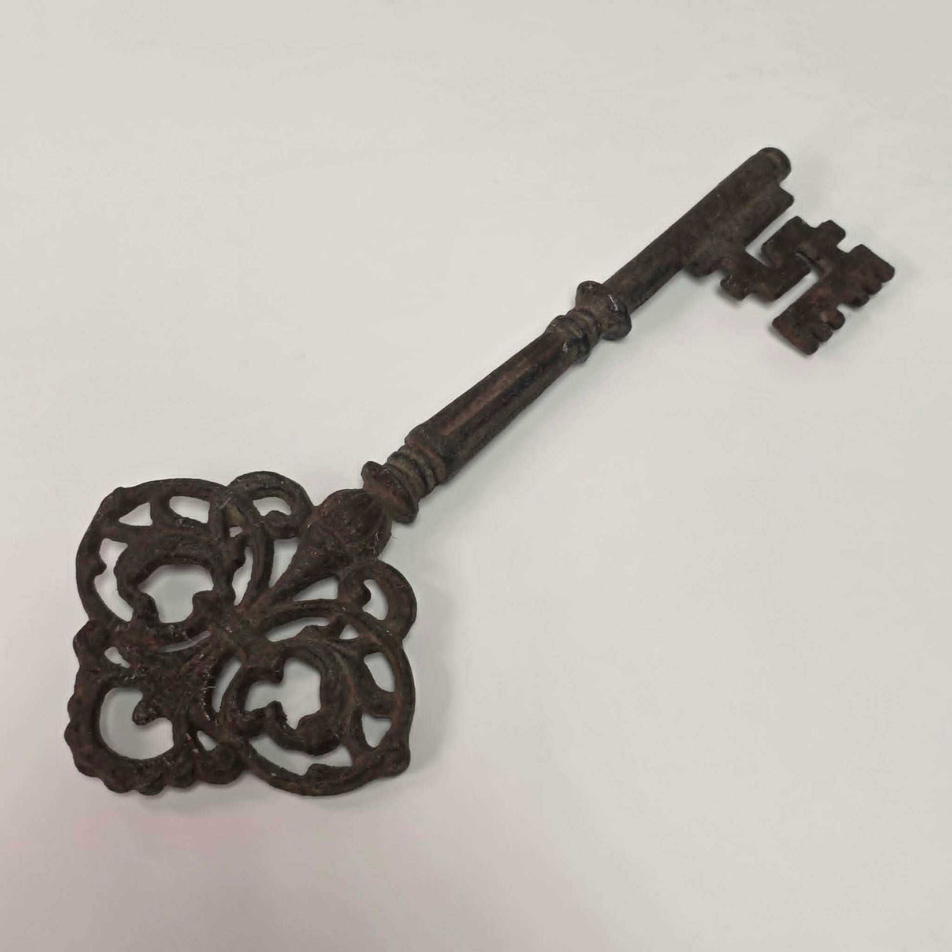 Large ornate cast iron Gothic medieval castle and church key.
