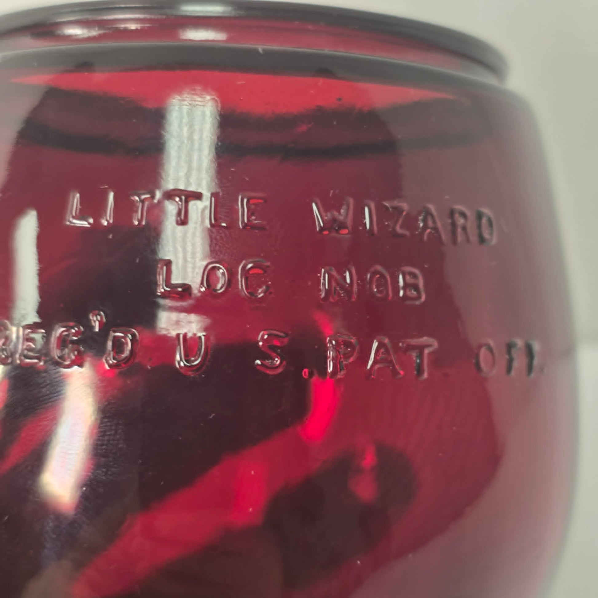 Mint condition Ruby Red Little Wizard globe by Dietz, Syracuse NY, USA.