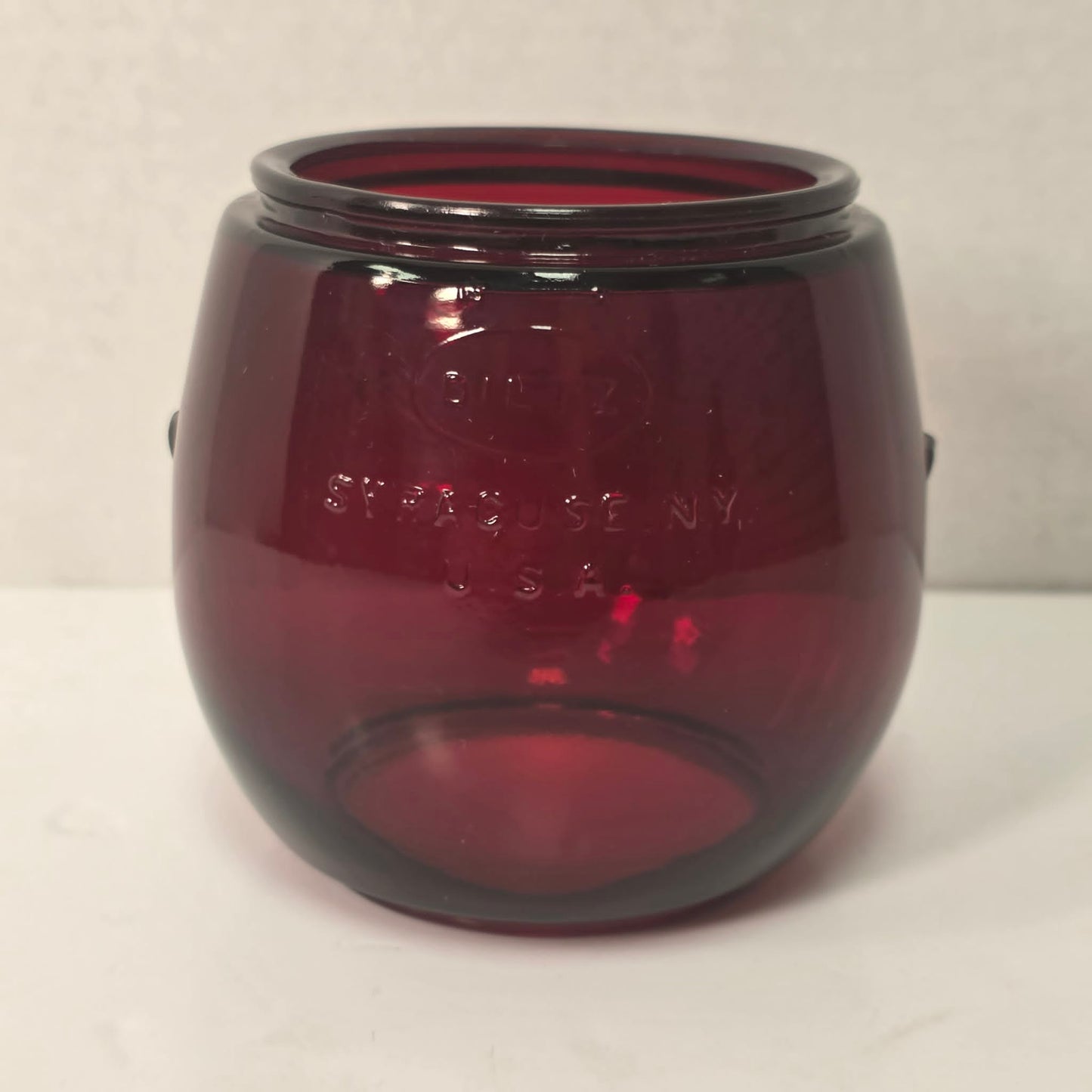 Mint condition Ruby Red Little Wizard globe by Dietz, Syracuse NY, USA.