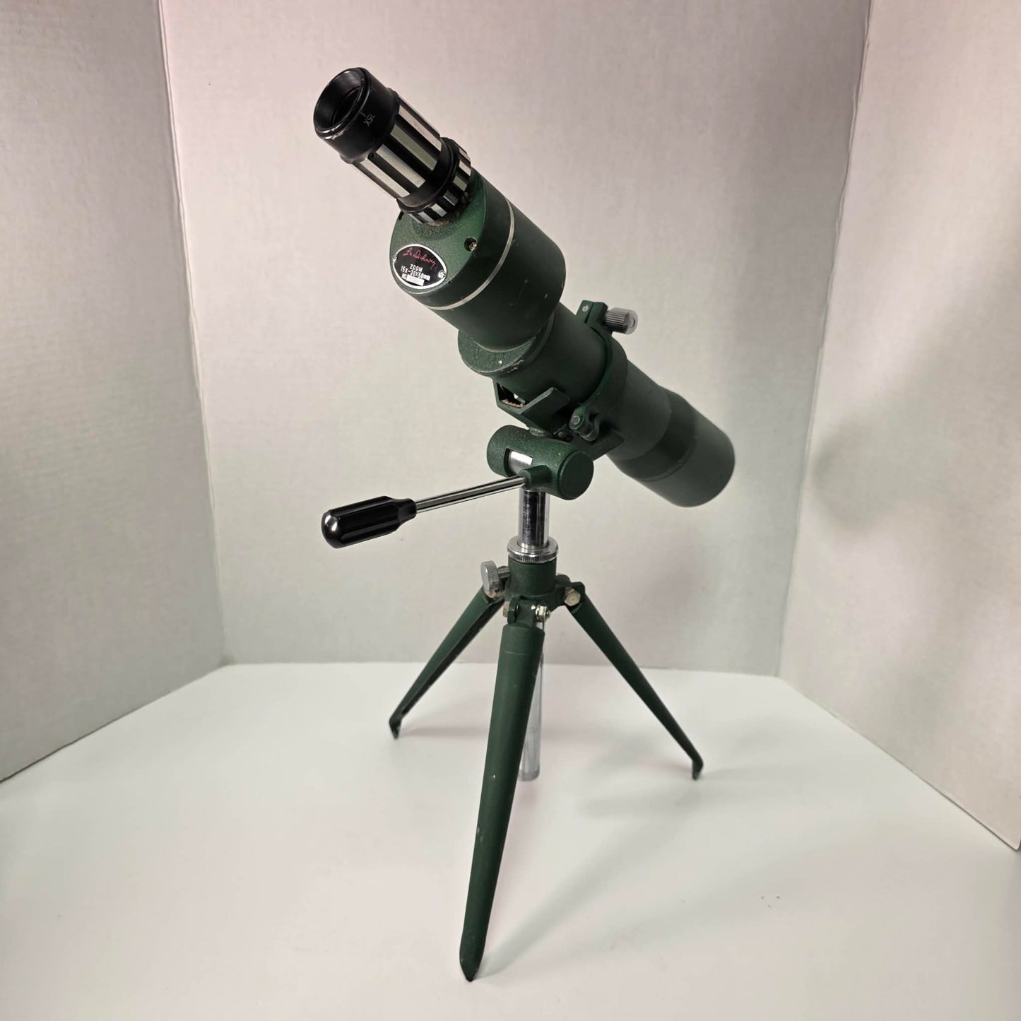 Vintage L.M. Dickson spotting scope 15–30x50 with tripod, mid-century hunting optics in good usable condition, model 14381.