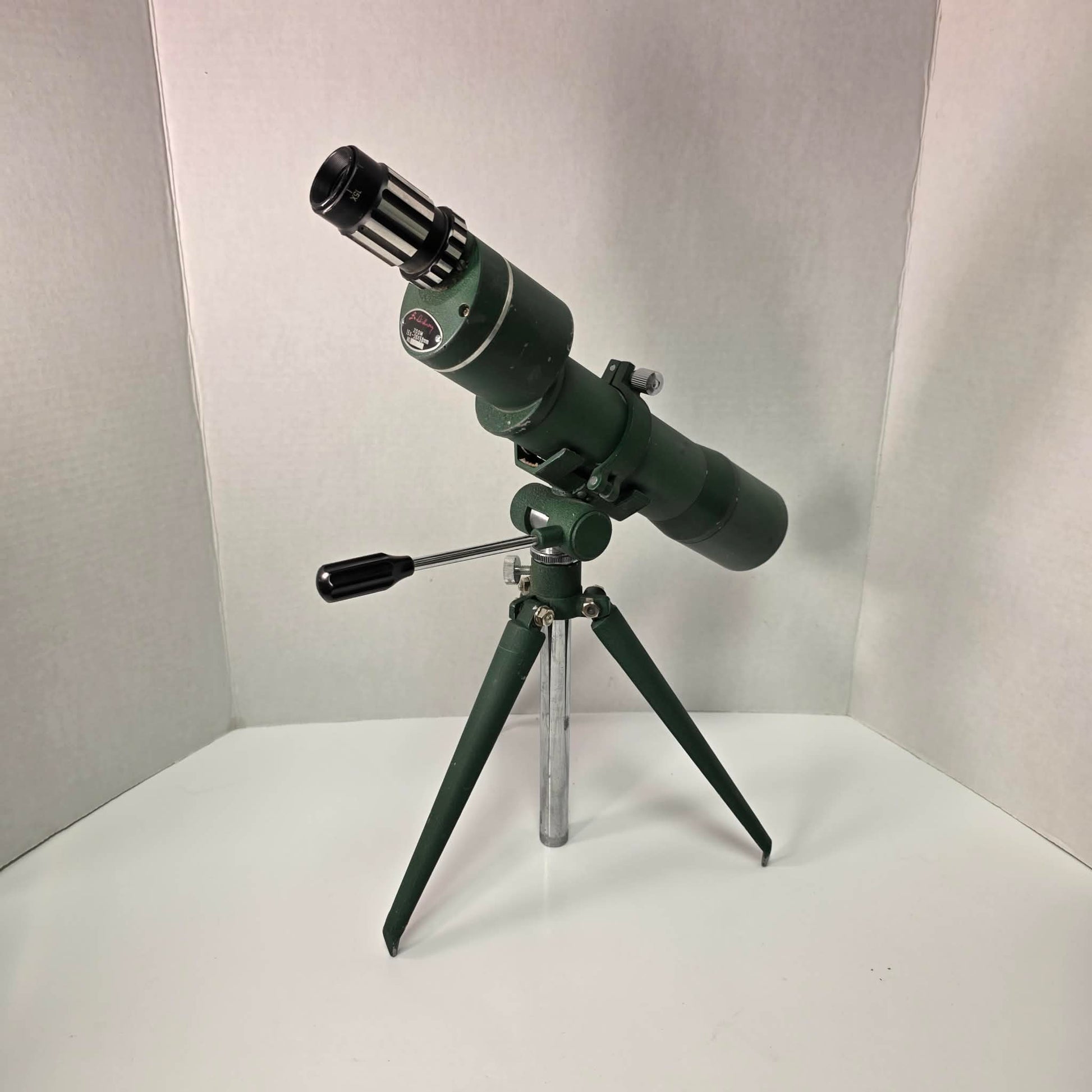 Vintage L.M. Dickson spotting scope 15–30x50 with tripod, mid-century hunting optics in good usable condition, model 14381.