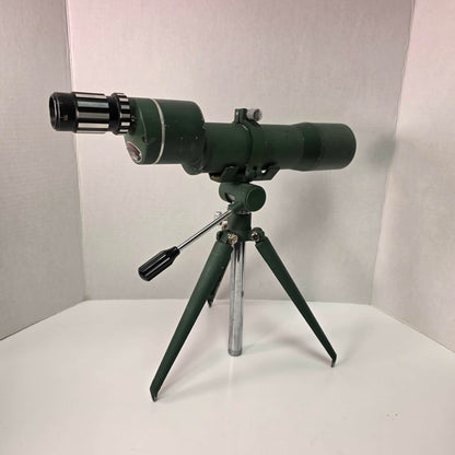 Vintage L.M. Dickson spotting scope 15–30x50 with tripod, mid-century hunting optics in good usable condition, model 14381.