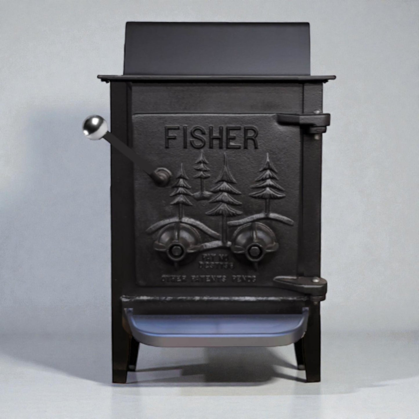 Black cast iron wood stove with 'Fisher' branding on a gray background