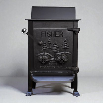 Black cast iron stove with 'Fisher' branding on a white background