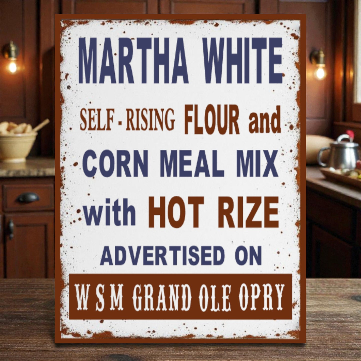 Vintage-style sign for Martha White flour and corn meal mix with hot rize in a kitchen setting.