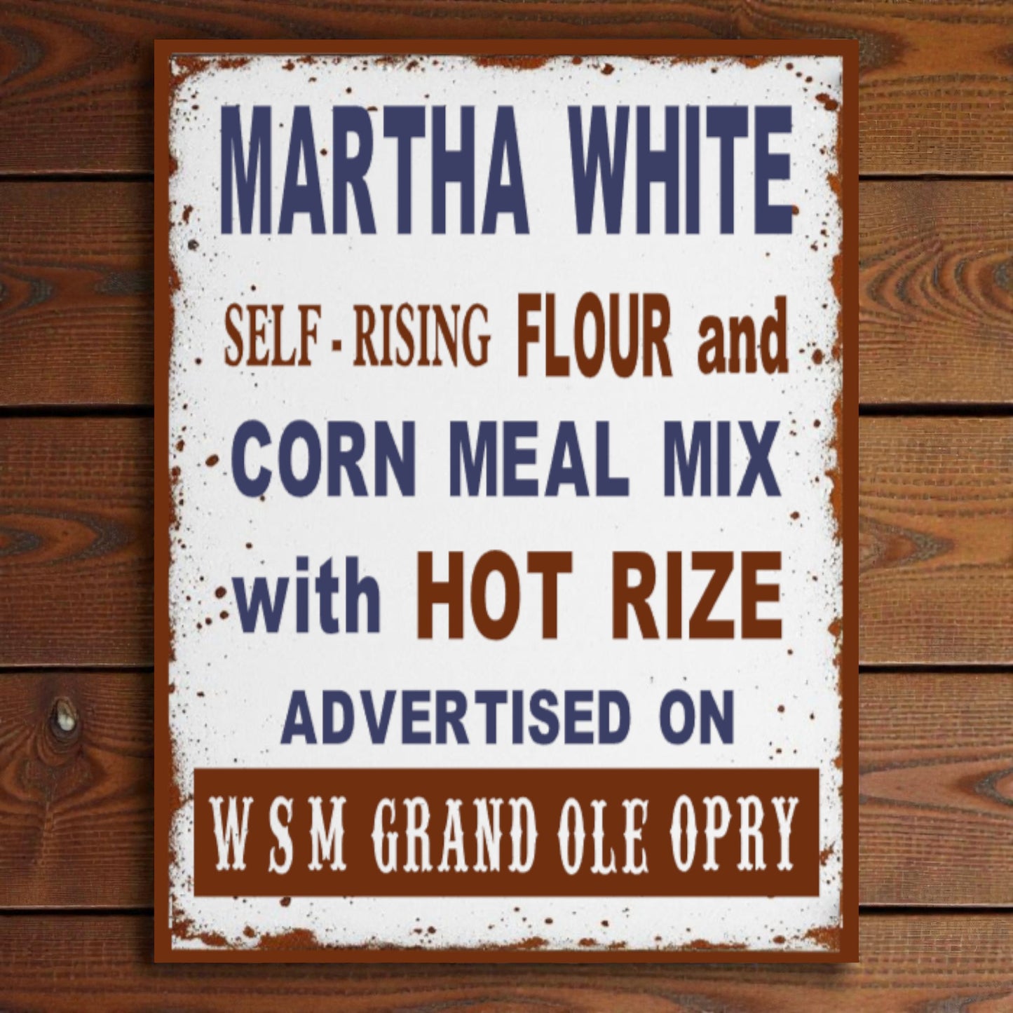 Vintage-style sign for Martha White flour and corn meal mix on a wooden background