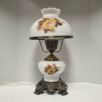 Pair of vintage Gone with the Wind lamps with floral glass and dual lighting.