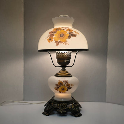Pair of vintage Gone with the Wind lamps with floral glass and dual lighting.