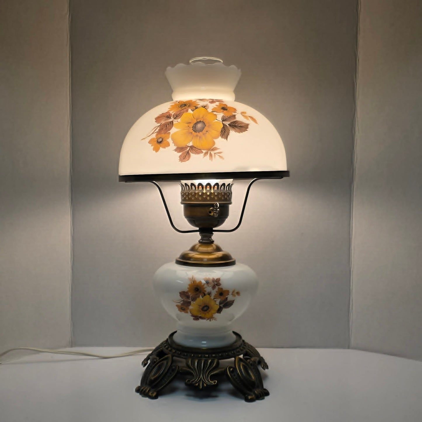 Pair of vintage Gone with the Wind lamps with floral glass and dual lighting.