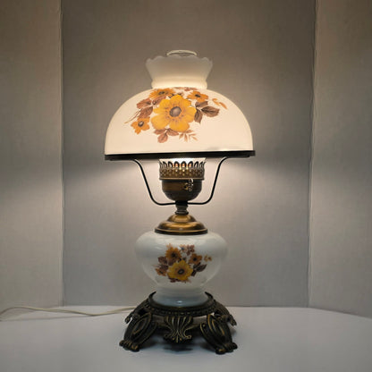 Pair of vintage Gone with the Wind lamps with floral glass and dual lighting.