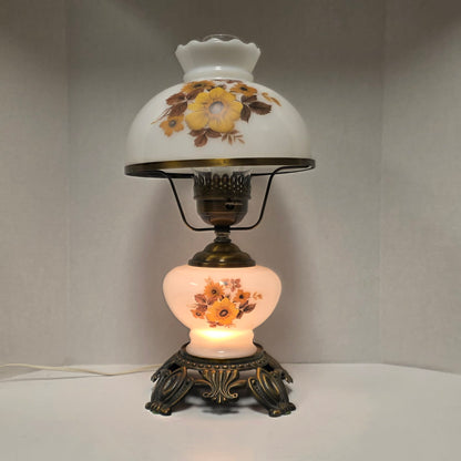 Pair of vintage Gone with the Wind lamps with floral glass and dual lighting.