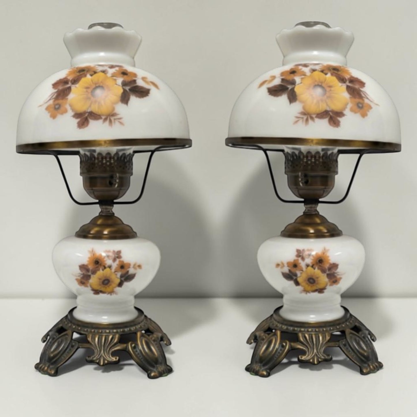 Pair of vintage Gone with the Wind lamps with floral glass and dual lighting.