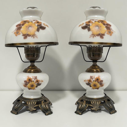 Pair of vintage Gone with the Wind lamps with floral glass and dual lighting.