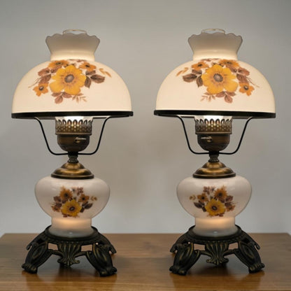 Pair of vintage Gone with the Wind lamps with floral glass and dual lighting.