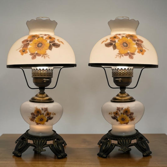 Pair of vintage Gone with the Wind lamps with floral glass and dual lighting.