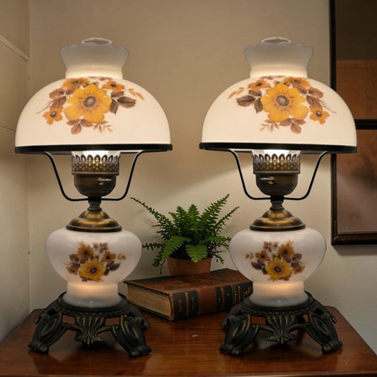 Pair of vintage Gone with the Wind lamps with floral glass and dual lighting.