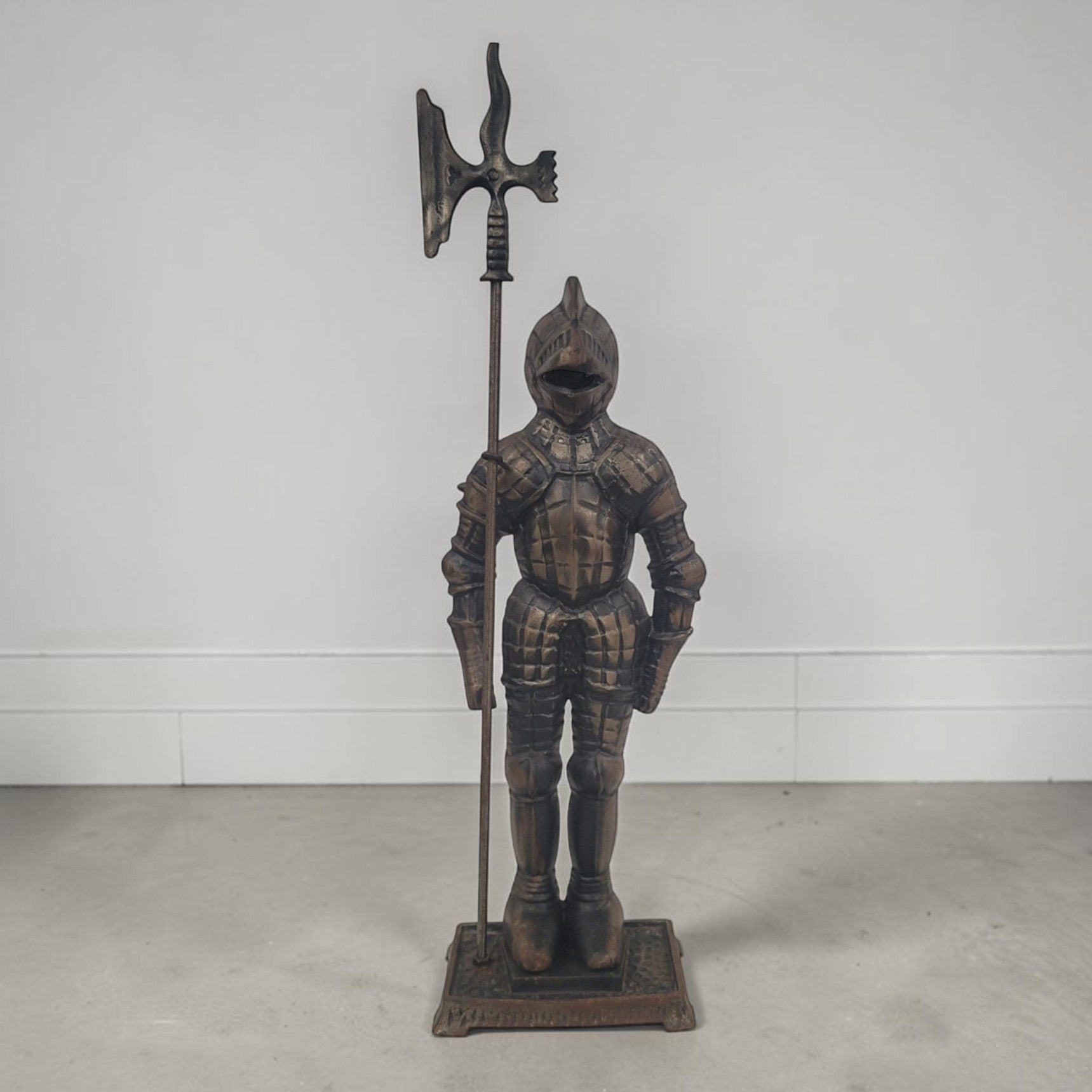 Large 30-inch medieval knight fireplace hearth statue with Arts and Crafts styling.
