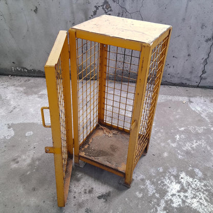 Versatile industrial metal wire cage – perfect as end table or lamp stand.