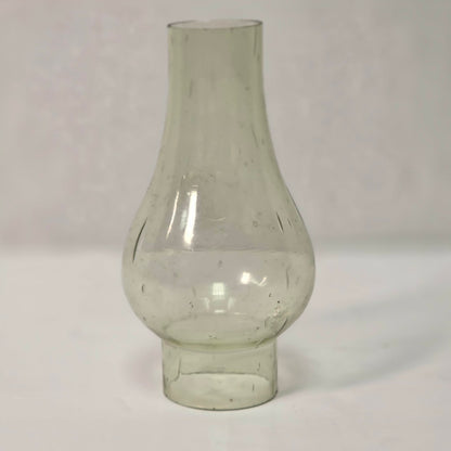 Antique miniature lamp chimney with primitive bubble glass inclusions.