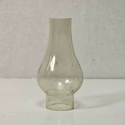 Antique miniature lamp chimney with primitive bubble glass inclusions.