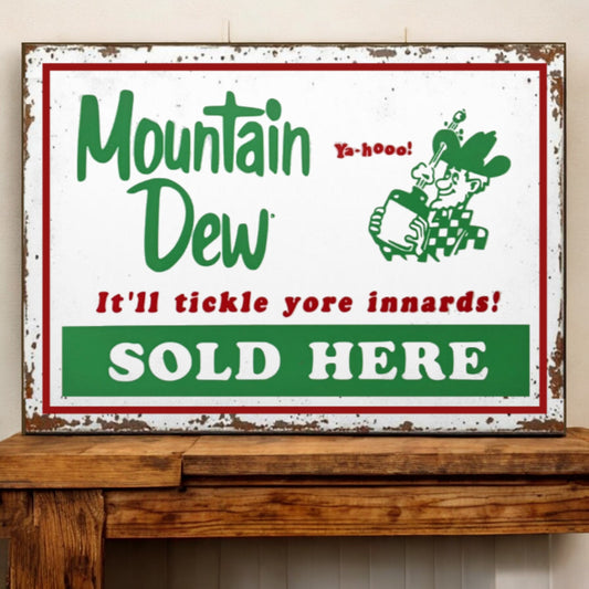 Vintage-style Mountain Dew sign on a wooden surface with a white background