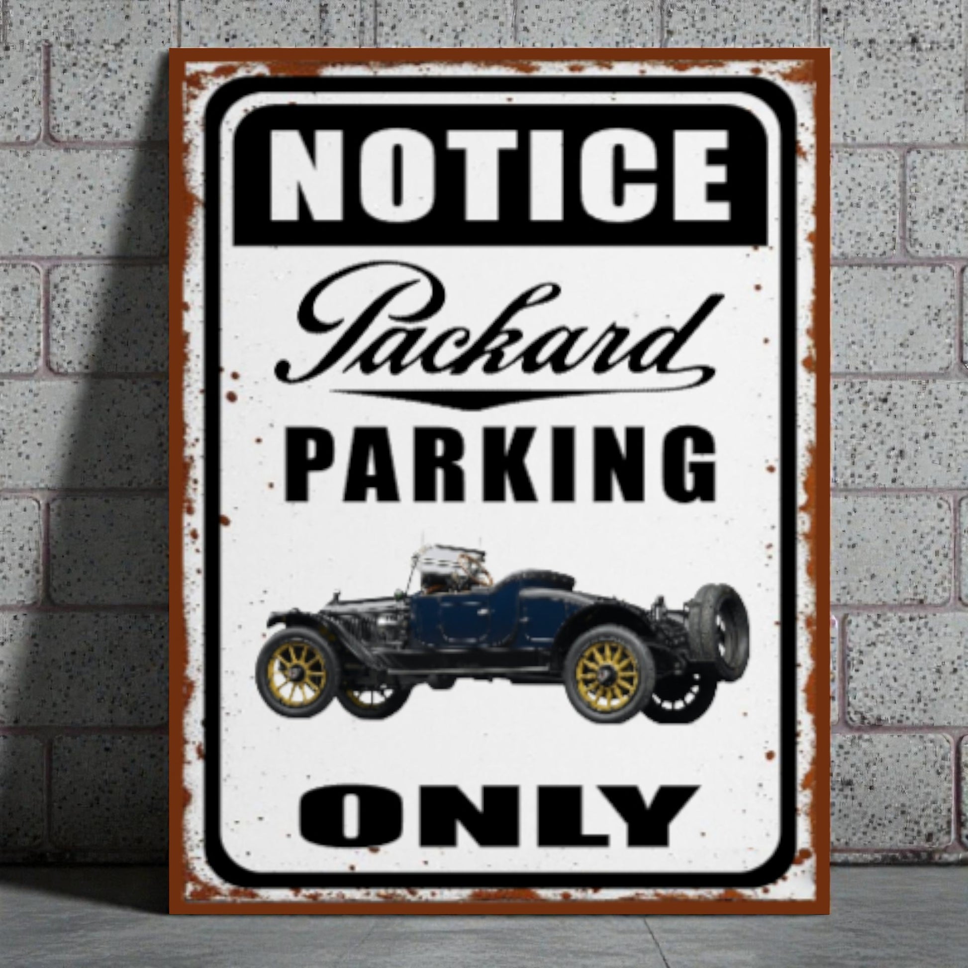 Vintage-style metal sign with Packard car illustration and 'Notice Packard Parking Only' text on a brick wall background.