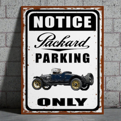 Vintage-style metal sign with Packard car illustration and 'Notice Packard Parking Only' text on a brick wall background.