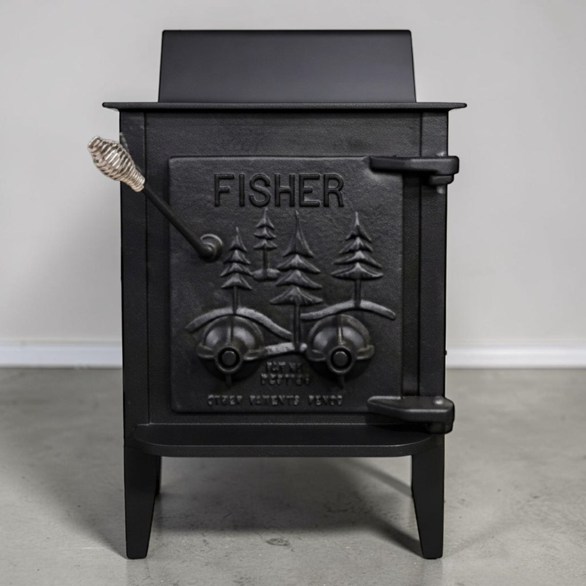 Papa Bear Fisher wood stove refurbished for dependable homestead and off-grid heating.
