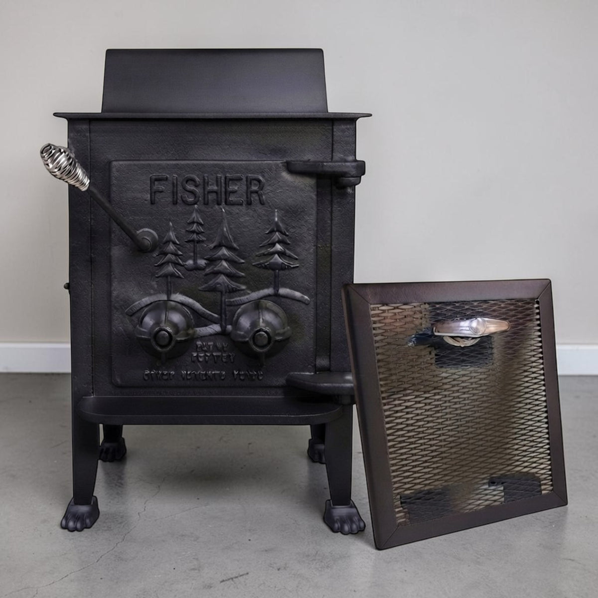 Papa Bear Fisher wood stove refurbished for dependable homestead and off-grid heating.
