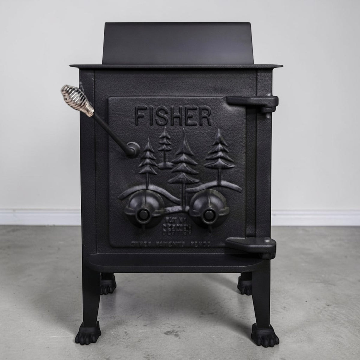 Papa Bear Fisher wood stove refurbished for dependable homestead and off-grid heating.
