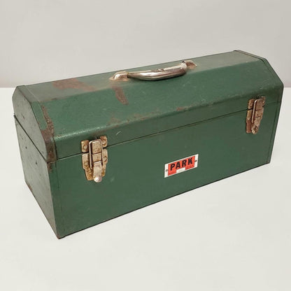 Green vintage toolbox with 'PARK' label on a white background