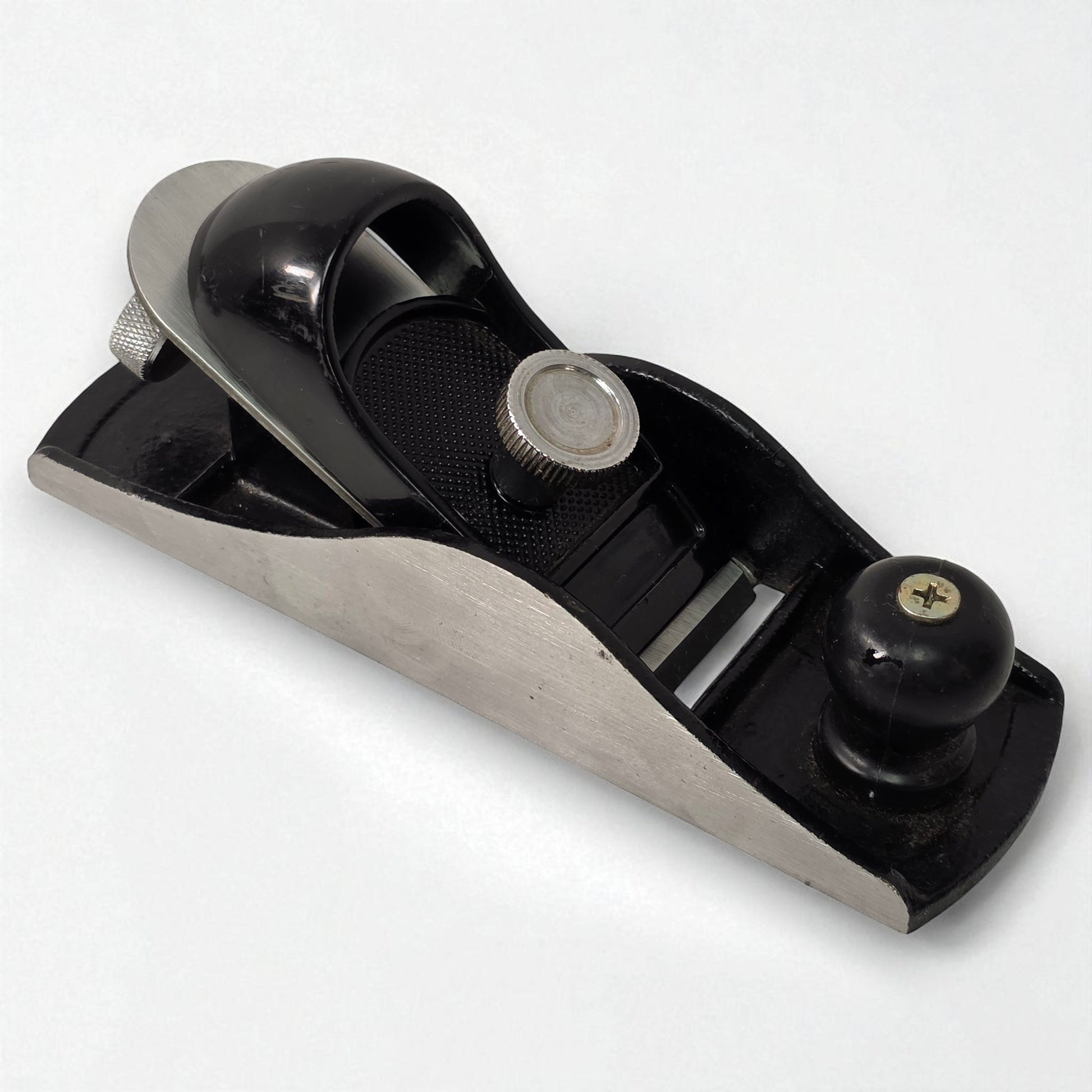 Woodworking plane tool on a white background